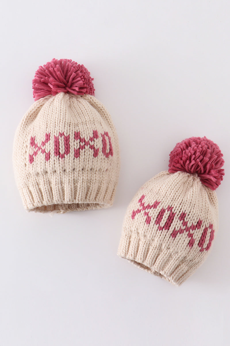 Cream XOXO knit beanie pom pom hat