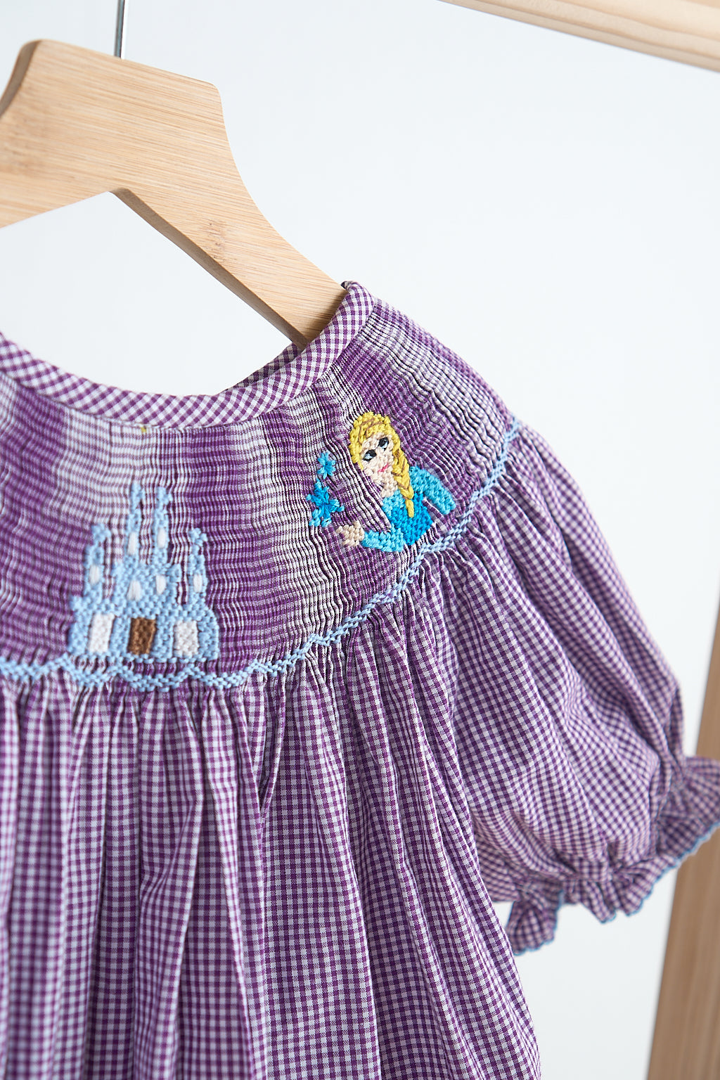 Purple castle hand smocked gingham dress