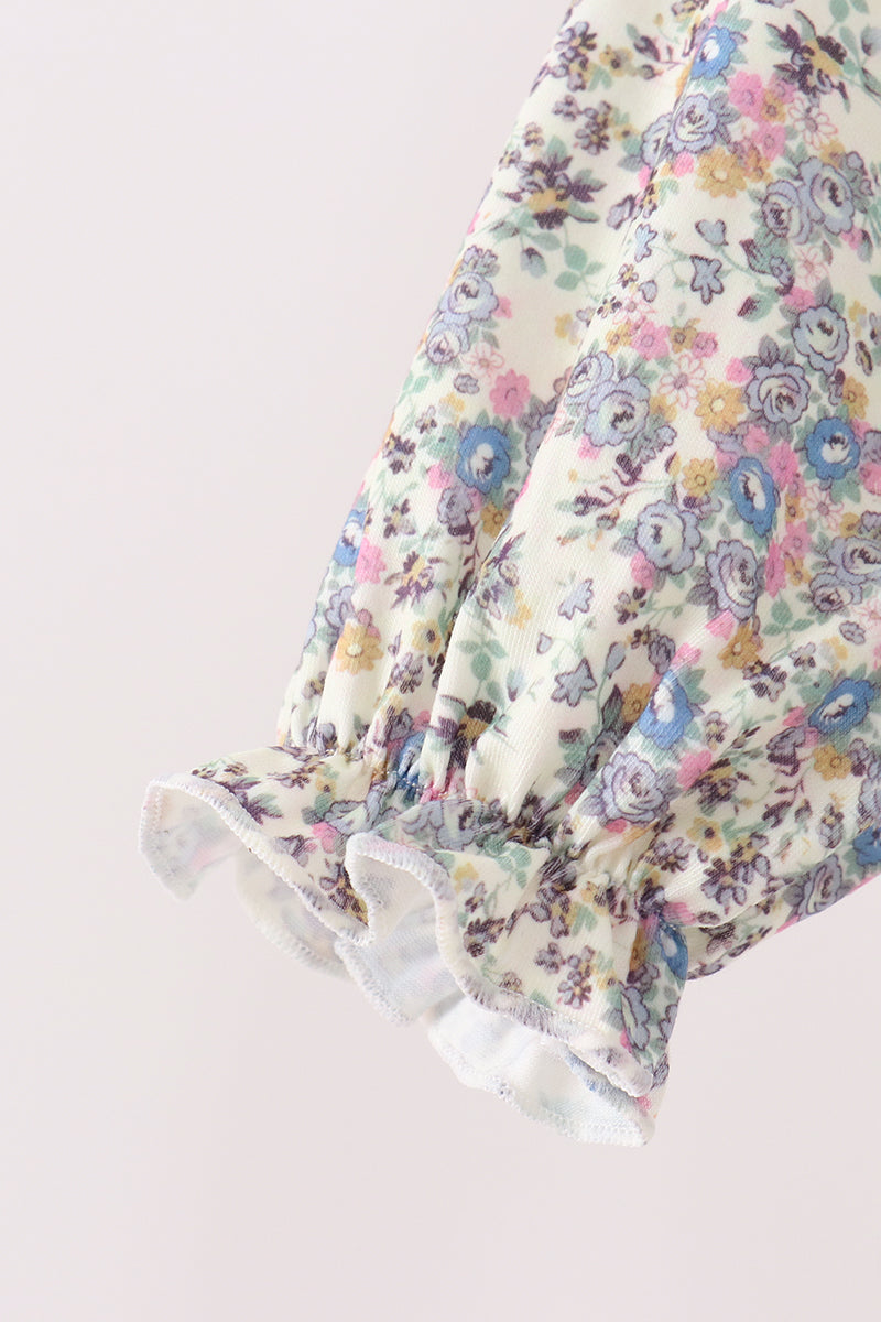 Blue floral smocked jumpsuit