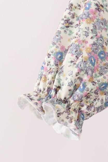 Blue floral smocked jumpsuit