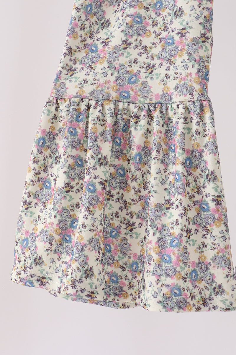 Blue floral smocked jumpsuit